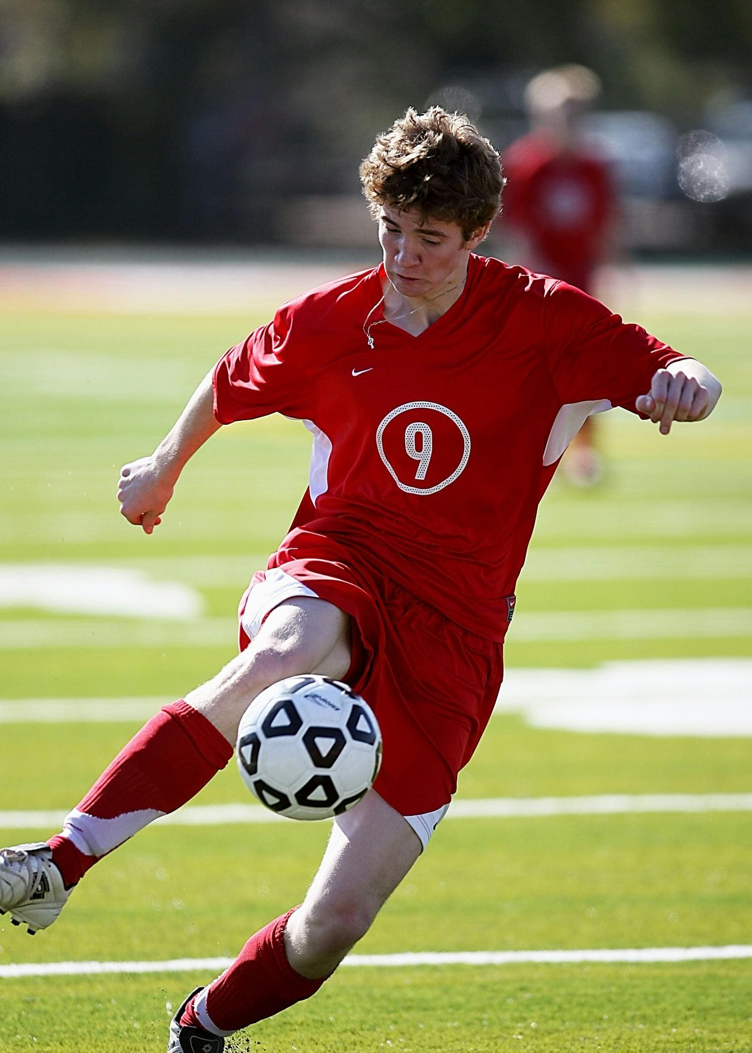Soccer player controlling the ball during a match